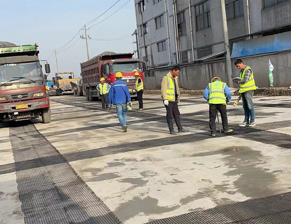 兰考老材料的新故事：玻璃纤维土工格栅如何在‘白改黑’浪潮中重获新生？